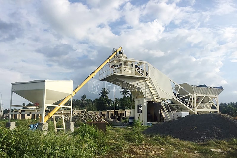 vue éloignée de la bétonnière JS500 et de la machine à doser