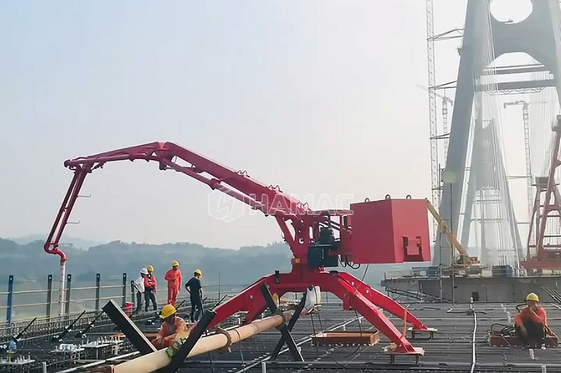 Qu'est-ce qu'une flèche de placement de béton araignée ?